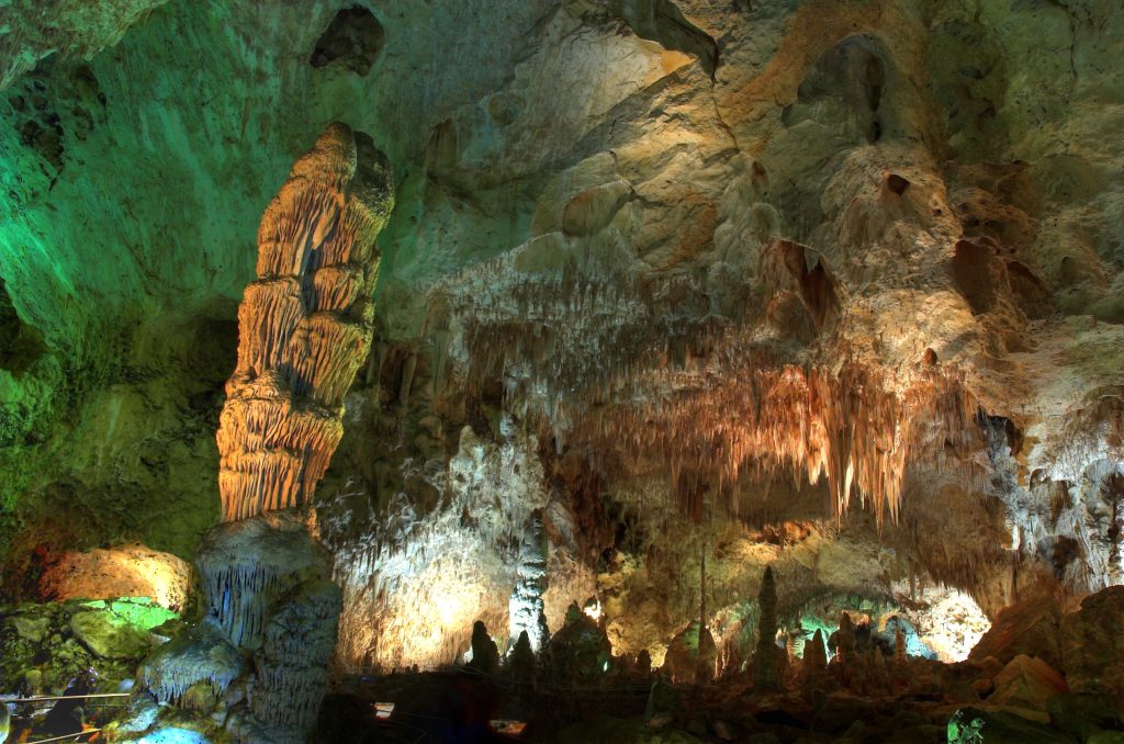 A stalagmite marks the area of Carlsbad Cavern known as the "Top of the Cross." It got its name from the lower-case "t" shape of the Big Room. https://creativecommons.org/licenses/by-nc-nd/2.0/legalcode