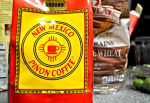 The packaging for New Mexico Pinon Coffee’s bag of ground coffee showcases their logo: a coffee mug inside of a Zia symbol. Photo by Veronica Munoz-De La Cruz / NM News Port 