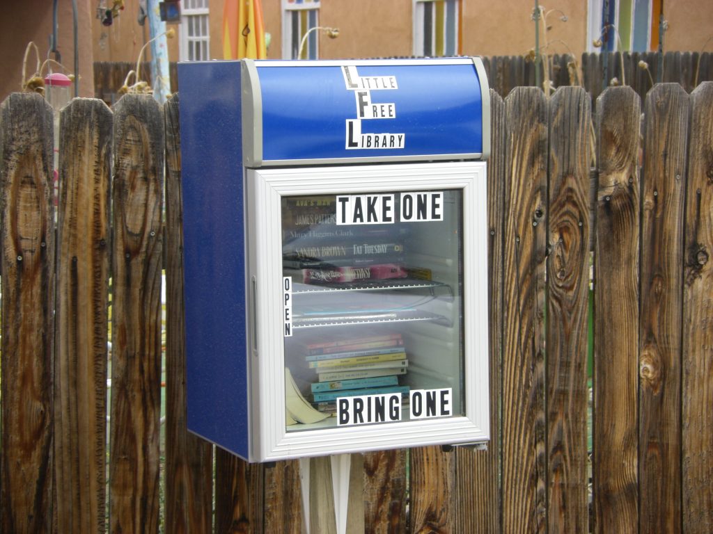 This little free library near Aztec and 4th Street NW is made out of an old refrigerator. Photo courtesy of Robert Shipley.