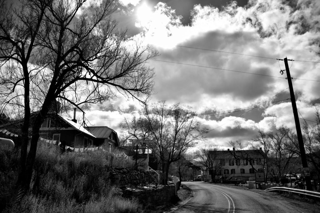 An elbow in the road crosses through Madrid, NM Sunday, Feb. 1, 2015. Photo by Emily Ediger / NM News Port
