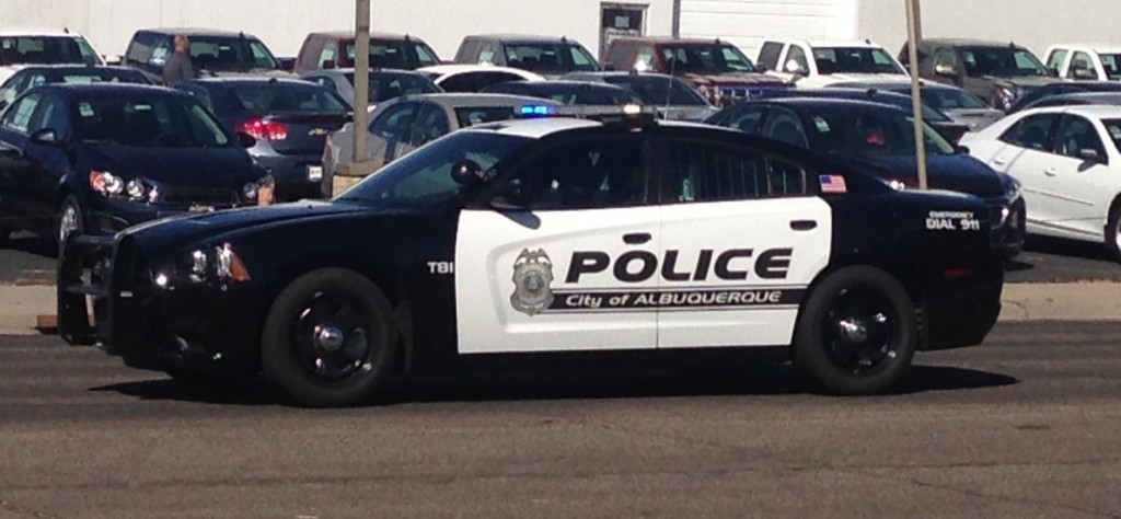 In 2011 APD switched to a vintage black and white paint scheme using Dodge Chargers as the new squad cars.  Photo by Kenneth Ferguson/ NM Newsport