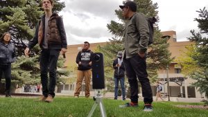 VR Cinema students practice making spherical time lapse videos with a 360 Ricoh Theta camera at UNM in April 2016. (Photo courtesy of Elan Collelo)