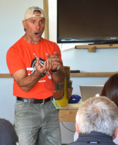 Ron Sciarrillo, education director of Earthship Biotecture’s Earthship Academy teaches his students the importance of job health and safety. Sciarrillo has been teaching classes at the academy since 2011. Photo by Brenna Kelley / NM News Port