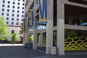 The STEM banners hang from the STEMulus center as the “honeycomb” design quickly draws your attention in. The STEMulus Center is located in the plaza near the Downtown Sports and Wellness Center. Photo: Monique Rinaldi/ New Mexico News Port