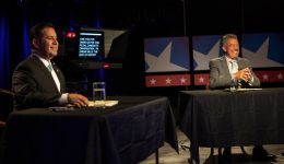Preparing to debate on NMPBS: Ben Ray Luhan (L) and Michael Romero (R). Photo by Kevin Maestas / NM News Port