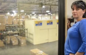 Sonya Warwick giving a tour of the Roadrunner Food Bank Oct. 11, 2016. Volunteers can help package food for distribution in their warehouse on Office Blvd NE Albuquerque. (Photo Credit: Natalie Baca)