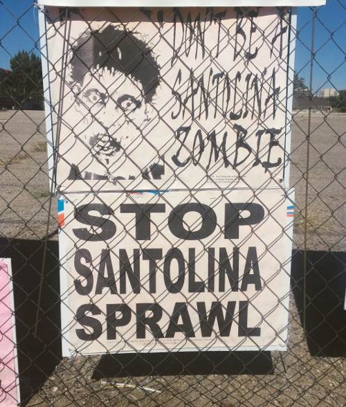 “Stop Santolina Sprawl” and “Don’t Be A Santolina Zombie” signs on Bridge Blvd., next to other political campaign signs. The Santolina Land Development is referenced as a “zombie zone,” due to the belief of it becoming another ghost-town development. Photo by Christina Rodriguez / NM News Port