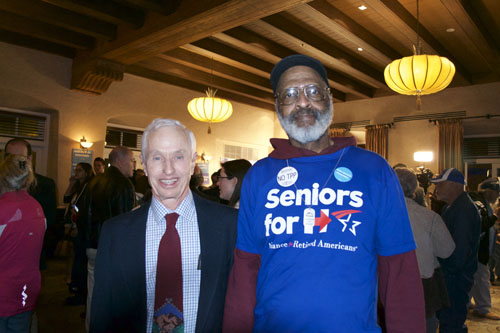 Charles Power (Left) and John Comstock (Right) show their support for Hillary Clinton at the Election Party. The Democratic watch party was held at the Hotel Andaluz. Photo by Mercedez Holtry / NM News Port 
