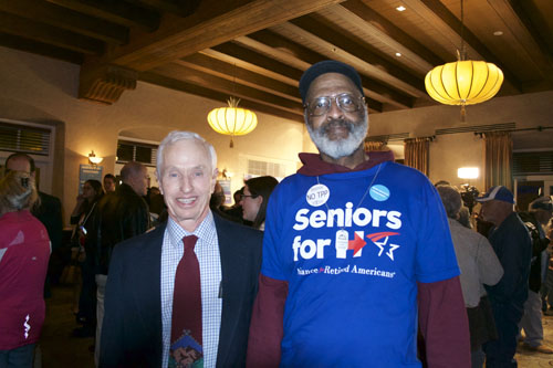 Charles Power (Left) and John Comstock (Right) show their support for Hillary Clinton at the Election Party. The Democratic watch party was held at the Hotel Andaluz. Photo by Mercedez Holtry / NM News Port