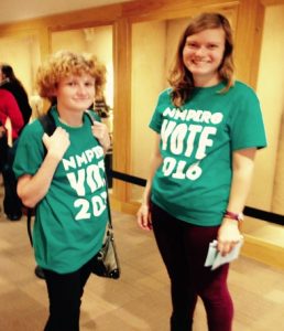 Cassandra Tofoya (left) and Hannah Perkins (right) stand outside the ballroom encouraging student voters to spread the word on where to vote here at the University of New Mexico. Some UNM students say the location is convenient for them