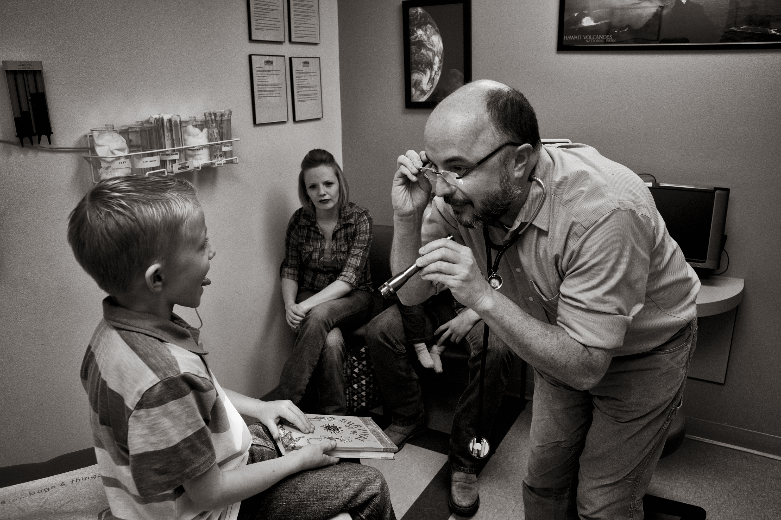 Dr. Brian Ehteridge seeing patients in his office in Silver City.