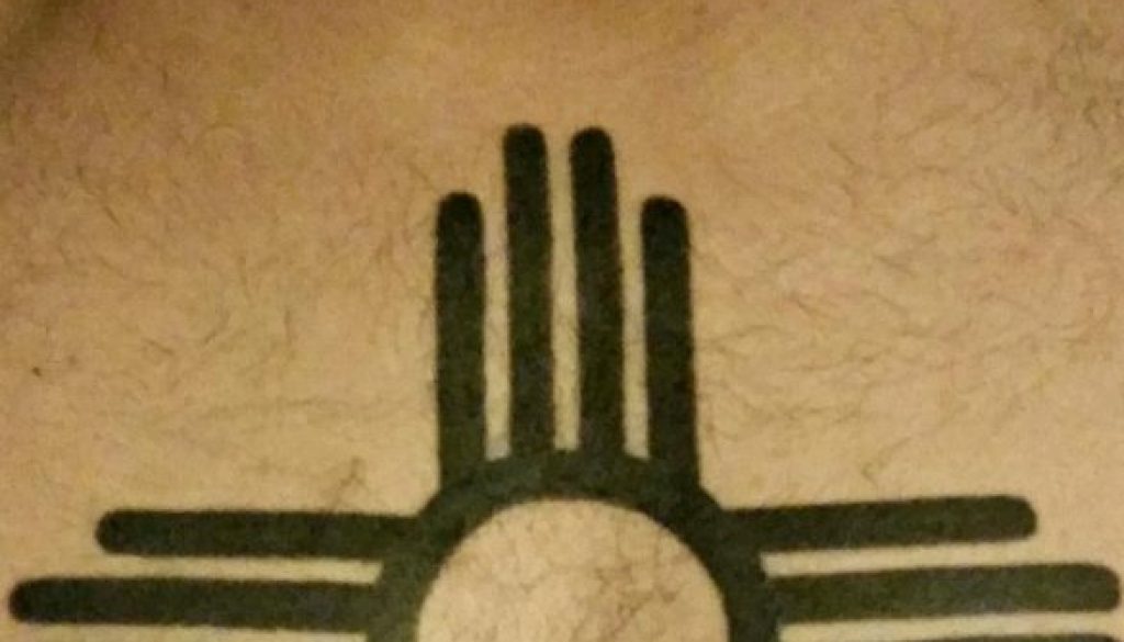 What do the colors of the Zia symbol represent? New Mexico News Port